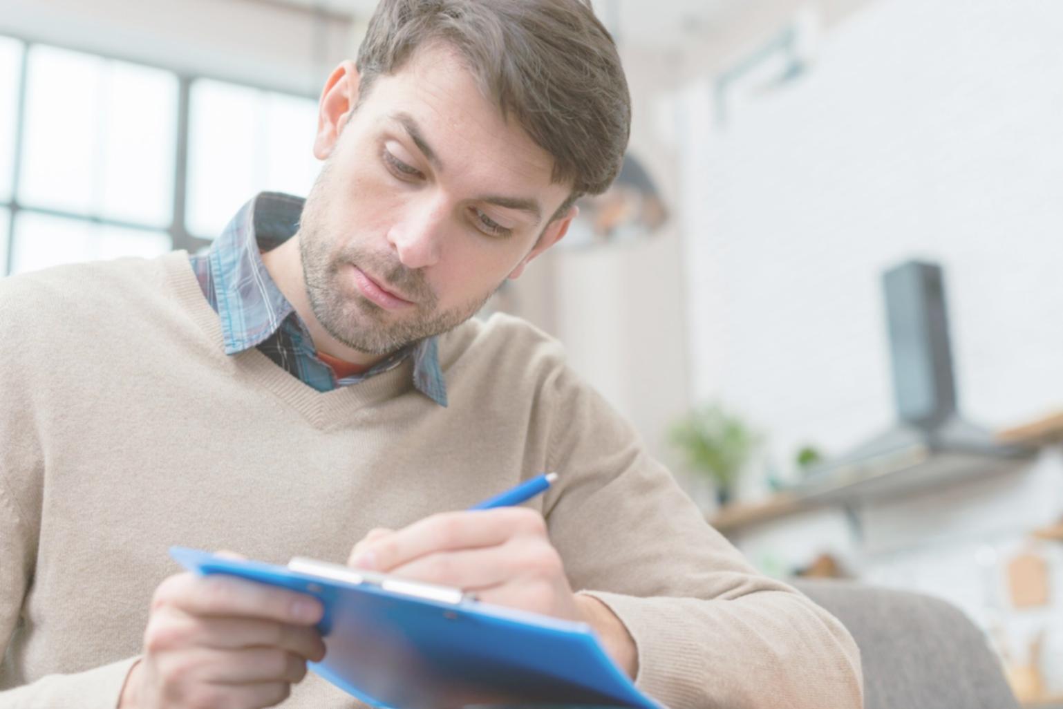 Professional working on valuation analysis with documents